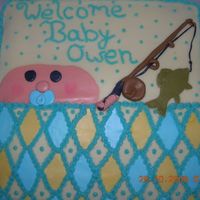 Fishing Baby This cake was done for a very close friend of mine. The father of the baby is a big time muskie fishing guy hence the fishing rod and fish...