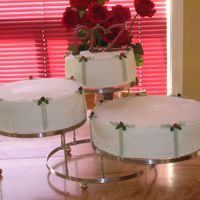 First Ever Wedding Cake Well this was my first attempt at a wedding cake. I think it turned out ok and the couple really liked it. It was lemon cake with butter...