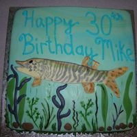 Tiger Muskie This cake was done for a guy who loves to muskie fish. The cake is half choc. half french vanilla, cover with butter cream and then fondant...
