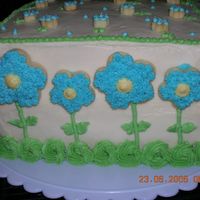 Cakes And Cookies I had a lot of fun making this one. All of the flowers are cookies. Even the small ones.