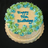 Fleurs Bleues French vanilla cake with lemon buttercream.