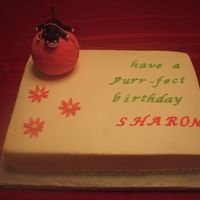 Sharon's Cat 13x9' cake. I combined 2 desings from my books. It was a cake for my mother in law. She loves cats. Ball was styrofoam, covered with...
