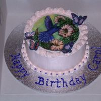 Hummingbird I used an edible image for this cake. I used butterflies printed on wafer paper that I cut out, spread with piping gel, and coated with...
