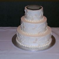 Scroll Wedding Cake This is a picture of the cake before the flowers were added at the reception site. Unfortunately the flowers weren't there when I...