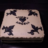Couples Bridal Shower Cake German Chocolate cake with pecan/coconut filling and buttercream icing and black fondant fleur de lis