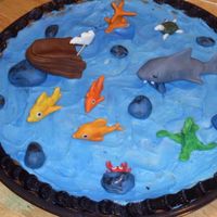 The Three Little Fish And The Big Bad Shark My husband, son and I made this ch. chip cookie cake for the school reading fair. Buttercream icing and fondant figures. My son won 3rd...