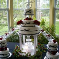 Classic Wedding Cake With A Modern Look black and red colors buttercream iced