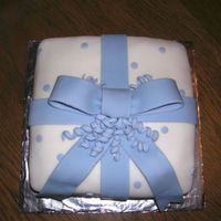 Gift Box this was a cake I did for the 3rd decorating class I took. First time I ever worked with fondant.