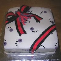 Gift Box 3 layer yellow cake with buttercream and MMF. simple cake. :)