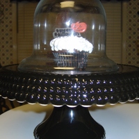 Halloween Cupcake On My New Cake Stand One of the halloween cupcakes, couldn't resist taking a picture with it on my new cake stand.