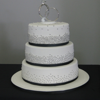 My First Wedding Cake My very first wedding cake! I have never stressed out so much for any cake. These were 14", 12" & 10" tiers. It had two...