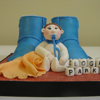 Baby Ugg Boots Topper A baby boy topper I made this week. It's for a baby shower in January for co-worker of my husband. I made baby Ugg boots from a...