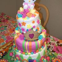 Alyssa's 7Th Birthday Topsy-Turvy Cake Rolled Fondant whimsical topsy-turvy cake consisted of three tiers of chocolate, vanilla rum, and a marble tier filled with dark chocolate...
