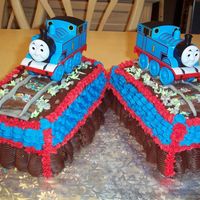 Thomas Tank Engine For Twins Two marble pound cakes of chocolate, almond, raspberry and rum baked in simple loaf pans, torted and filled and then simply iced. Decorated...
