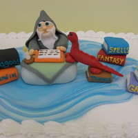 Wizard 101 This was for a 15 year old boy who was into reading and Greece and Italy (hence, the books) and fantasy. I loved doing this cake. It was...
