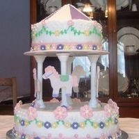 Carosel Cake Cake for my daughter's 5th birthday. Buttercream with fondant decorations.
