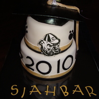 Black And Gold Graduation Cake Buttercream with fondant with fondant decorations. Hand painted bulldog plaque on gumpaste - motarboard also gumpaste