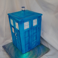 Dr. Who Tardis Cake Gumpaste panels for the sides and top of tardis. This was a bit more time consuming, but really fun to make for a Dr. Who fan.