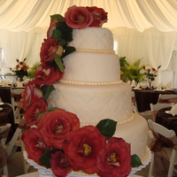 Ivory Quilted Wedding Cake Big Wedding Cake- BC filling covered with fondant- 16-12-8-6 tiers.First time using tall Pillars- Worried about stacking all that weight...