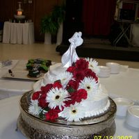 Wedding Cake This is a wedding cake that I did for my adopted daughter. Just at a different angel than the other one. Red velvet and vanilla cake and it...