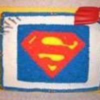 Superman Logo Made for my son's 8th birthday. He insisted that his Superman figure needed to be on the cake also. All buttercream. Done free-hand