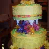 Yellow Floral 2 tier round with fresh flowers and purchased floral ribbion for border