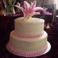 Stargazer Lily I made this for a friend's baby shower - white cake with strawberry cream filling & cream cheese icing. I used the crusting recipe...