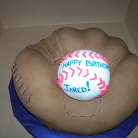 Baseball And Mit all is made out of cake. the ball is a personal for Jared
