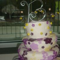 Bee Cake This is one of my favorites, the couples first and last initial started with a "B"The bees as well as the cake are made with MMF...