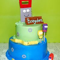 Handy Manny's Tools 2- 6 inch rounds over 2- 9inch rounds, fed 40. Fondant tools, wood, and measuring tape.