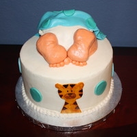 Baby Rump Another baby rump. This time on an 8" cake. Buttercream frosting on cake, fondant for baby rump. Yellow Almond Sour Cream Cake with a...