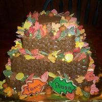 Wedding_Cake.jpg This was made for my neighbor who is having their wedding in November and she wanted a "fall" wedding cake theme. All the leaves...
