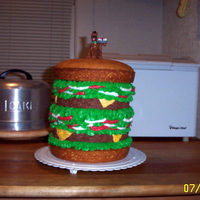 Scooby Doo Birthday Burger Giant Burger Cake with a Scooby Doo Candle topper.