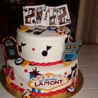 Vegas Birthday Made for a man who loves vegas, music and black jack. Covered in mmf, with 50/50 mic of gumpaste and mmf to make cards, juke box, vegas...