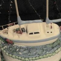 Christmas Boat Cake This is a close-up of a small Christmas cake I was asked to make by a customer for a party. She lives on a houseboat in a place where they...