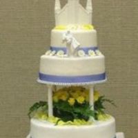 First Wedding Cake This was my first wedding cake. It was a white and choco fudge marble cake with my canolli filling covered in fondant. I made the temple...