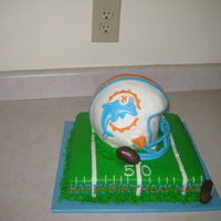 Miami Dolphins Cake lots of mishaps for this cake, but when all was said and done (out the door) it turned out ok! glad to see this one go! tfl