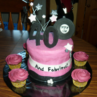 40Th Birthday Accents (stars, 40, record) are fondant. The large cake was basic chocolate cake with buttercream icing, cupcakes were for the adults,...