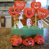 Valentine Day Treats Heart shaped rice crispy treats and love bugs.