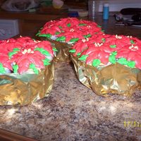 Poinsettia Cupcake Bouquet Cupcake bouquet made into a poinsettia plant. Thank you Yvonne for inspiration and showing were the direction were on CC from cncgirl00.