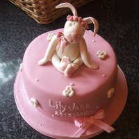 Ivory And Pink Rabbit Topper ,christerning Cake I made this cake for my Granddaughters Christerning in May.The little rabbit and flowers were made up as I went along.