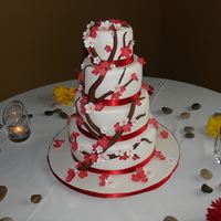 Cherry Blossoms White chocolate cake with fresh raspberry filling.
