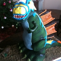 Standing Dinosaur Carved 3d dinosaur cake covered in fondant.