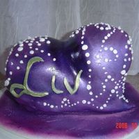 Liv's Cake This is a design borrowed from Collette Peter's "Cakes to Dream On"--a sculptured heart cake, covered in fondant and...