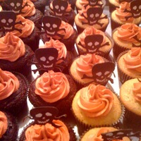 Halloween Party Cupcakes Vanilla and Chocolate cupcakes with vanilla buttercream frosting.