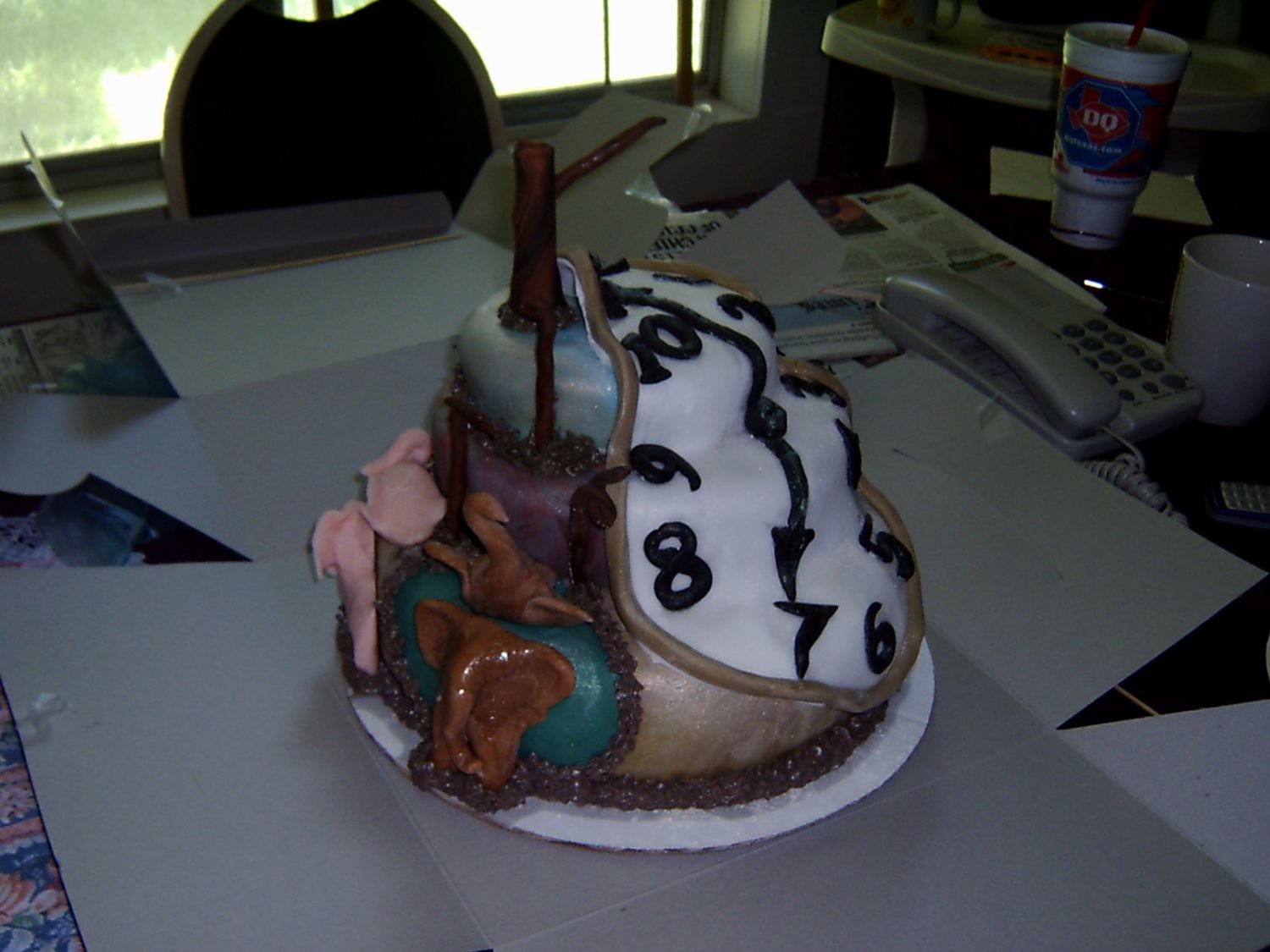 Salvador Dali Interp. I made this cake for my mom's bday. she loves the artist salvador dali it was all fondant and edible.