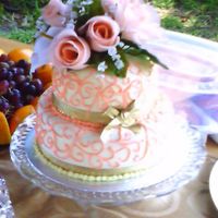 118295529776292.jpg Small wedding cake french vanilla with cream cheese filling.