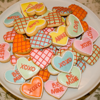Valentines Hearts Sugar cookies with royal icing. sanding sugar and dragees for the accents.