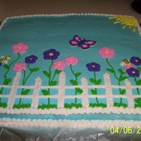 Spring Cake This is two 12x18 cakes together. This was the most difficult cake I've ever made. It kept cracking so I had to make one of the cakes...