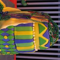 Mardi Gras One of the biggest cakes I've made yet! All marshmallow fondant.